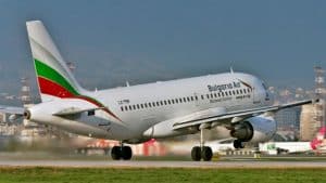 a white airplane taking off
