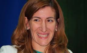 a woman smiling at the camera