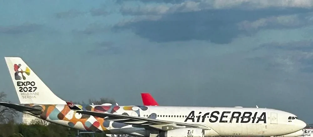 two airplanes on a runway