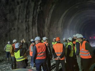 a group of people in a tunnel
